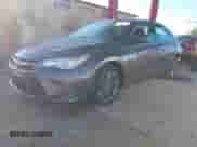 2016 Toyota Camry XLE with VIN 4T1BF1FK7GU171235, listed as a IAAI auction lot 43264854 with 124,422 mi miles and . Bid and sale history available at DreamBid. Image 2.