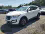2014 Hyundai Santa Fe z VIN 5XYZUDLB7EG156988, wystawiony jako Copart lot #67725145 z przebiegiem 119 777 mil mil oraz Nie do naprawy • Non repairable. Historia ofert i sprzedaży dostępna na DreamBid. Obrazek 1.