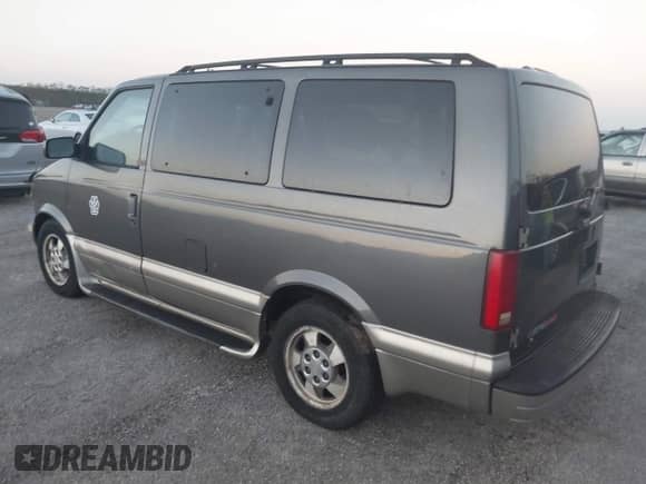 2003 Chevrolet Astro z VIN 1GNEL19X63B115821, wystawiony jako IAAI lot #41923632 z przebiegiem 107 341 mil mil oraz . Historia ofert i sprzedaży dostępna na DreamBid. Obrazek 3.