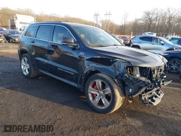 2015 Jeep Grand Cherokee SRT with VIN 1C4RJFDJ6FC744087, listed as a IAAI auction lot 41500653 with 130,530 mi miles and . Bid and sale history available at DreamBid. Image 1.