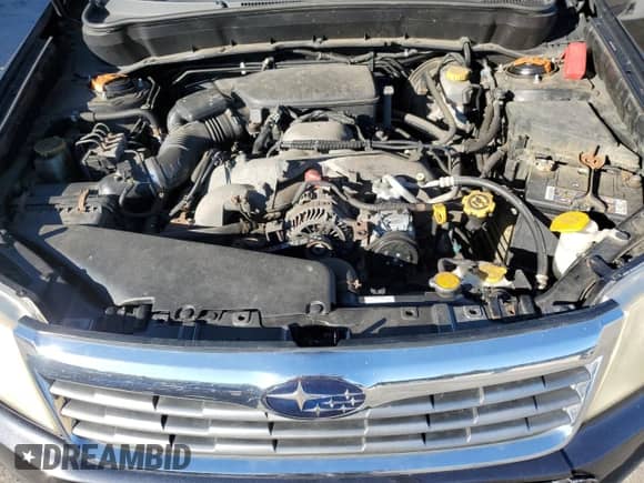 2009 Subaru Forester X with VIN JF2SH63649H725153, listed as a Copart auction lot 82190825 with 207,429 mi miles and Salvage title. Bid and sale history available at DreamBid. Image 12.