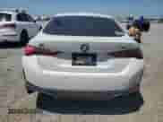 2022 BMW i4 eDrive40 with VIN WBY73AW04NFN12057, listed as a Copart auction lot 67297925 with 69,670 mi miles and Salvage title. Bid and sale history available at DreamBid. Image 6.