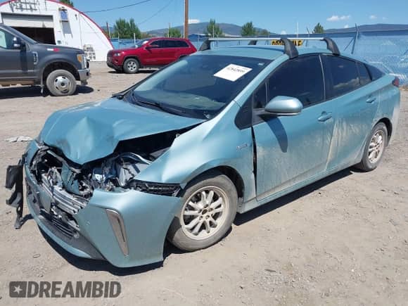 2021 Toyota Prius LE with VIN JTDL9MFU9M3023818, listed as a IAAI auction lot 42842899 with 99,876 mi miles and . Bid and sale history available at DreamBid. Image 17.
