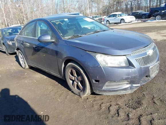 2013 Chevrolet Cruze 1LT with VIN 1G1PD5SB1D7328161, listed as a IAAI auction lot 41360894 with 189,868 mi miles and . Bid and sale history available at DreamBid. Image 1.