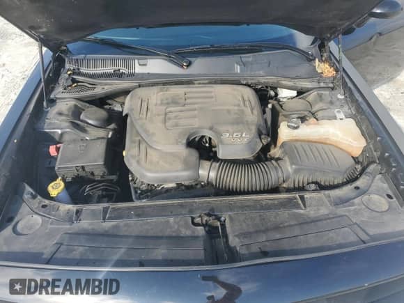 2020 Dodge Challenger SXT with VIN 2C3CDZAG7LH148460, listed as a Copart auction lot 70859015 with 142,881 mi miles and Salvage title. Bid and sale history available at DreamBid. Image 11.