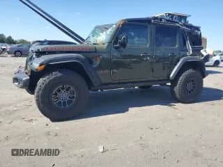 2022 Jeep Wrangler Unlimited Rubicon with VIN 1C4JJXFG6NW171967, listed as a Copart auction lot 84758785 with 47,115 mi miles and Salvage title. Bid and sale history available at DreamBid. Image 1.