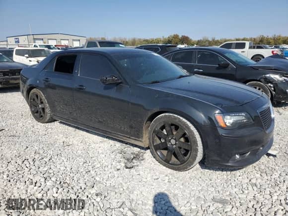 2014 Chrysler 300 SRT-8 with VIN 2C3CCAFJ3EH256845, listed as a Copart auction lot 77766654 with 86,962 mi miles and Salvage title. Bid and sale history available at DreamBid. Image 4.