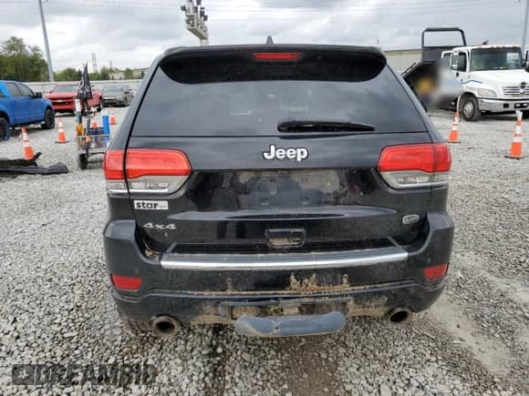 2017 Jeep Grand Cherokee Overland with VIN 1C4RJFCG7HC684748, listed as a Copart auction lot 81811815 with 72,945 mi miles and Salvage title. Bid and sale history available at DreamBid. Image 6.