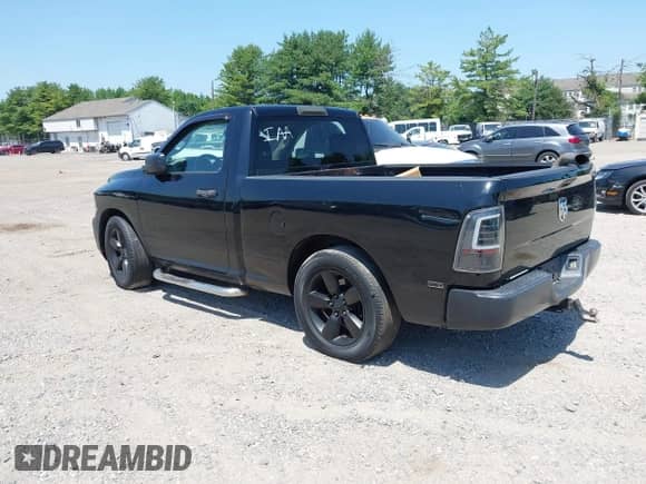 2012 Ram 1500 ST with VIN 3C6JD6APXCG277074, listed as a IAAI auction lot 42557652 with 261,698 mi miles and . Bid and sale history available at DreamBid. Image 3.