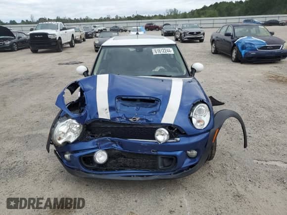 2013 MINI Hardtop S with VIN WMWSV3C57DT476394, listed as a Copart auction lot 61612244 with 140,264 mi miles and Salvage title. Bid and sale history available at DreamBid. Image 5.