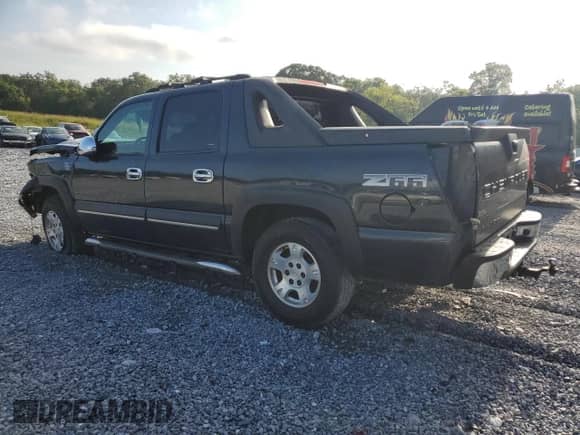 2003 Chevrolet Avalanche с VIN 3GNEC13T33G228297, выставлен на аукционе Copart как лот 69616165 с пробегом Не указан миль и Списание • Salvage title. История ставок и продаж доступна на DreamBid. Изображение 2.