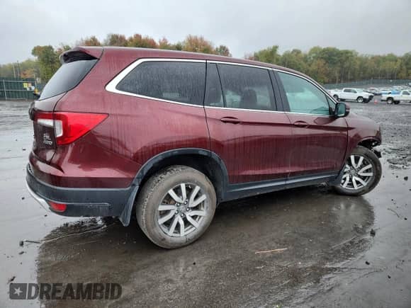 2019 Honda Pilot EX-L z VIN 5FNYF6H5XKB083266, wystawiony jako Copart lot #82401705 z przebiegiem Nie podano mil oraz Szkoda całkowita • Salvage title. Historia ofert i sprzedaży dostępna na DreamBid. Obrazek 3.