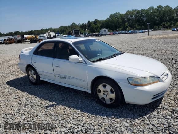 2001 Honda Accord EX z VIN 1HGCG16561A061805, wystawiony jako Copart lot #70577215 z przebiegiem 233 090 mil mil oraz Szkoda całkowita • Salvage title. Historia ofert i sprzedaży dostępna na DreamBid. Obrazek 4.