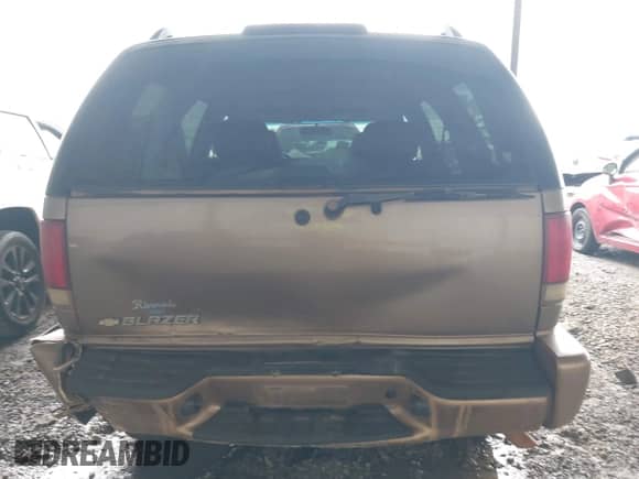 2004 Chevrolet Blazer LS with VIN 1GNDT13X54K159900, listed as a IAAI auction lot 42374099 with 111,023 mi miles and . Bid and sale history available at DreamBid. Image 17.