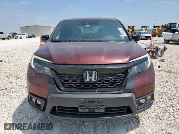 2020 Honda Passport EX-L with VIN 5FNYF8H57LB014709, listed as a Copart auction lot 71562815 with 73,522 mi miles and Salvage title. Bid and sale history available at DreamBid. Image 5.