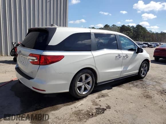 2019 Honda Odyssey EX-L with VIN 5FNRL6H79KB022392, listed as a Copart auction lot 82048715 with 88,206 mi miles and Salvage title. Bid and sale history available at DreamBid. Image 3.