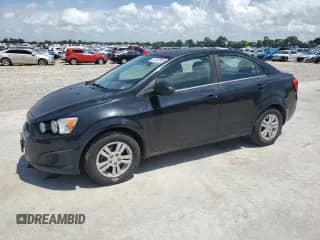 2013 Chevrolet Sonic LT с VIN 1G1JD5SH1D4160761, выставлен на аукционе Copart как лот 61407935 с пробегом 152 962 миль миль и Списание • Salvage title. История ставок и продаж доступна на DreamBid. Изображение 1.