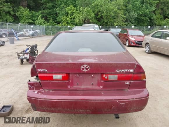 1997 Toyota Camry LE z VIN 4T1BF22K8VU005878, wystawiony jako IAAI lot #42447380 z przebiegiem 180 256 mil mil oraz . Historia ofert i sprzedaży dostępna na DreamBid. Obrazek 16.