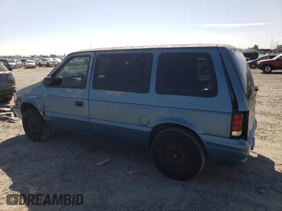 1995 Dodge Caravan with VIN 2B4GH4535SR353065, listed as a Copart auction lot 71745595 with 99,443 mi miles and Salvage title. Bid and sale history available at DreamBid. Image 2.