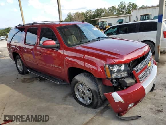 2013 Chevrolet Suburban LT with VIN 1GNSCJE09DR122234, listed as a Copart auction lot 81731335 with 134,660 mi miles and Salvage title. Bid and sale history available at DreamBid. Image 4.