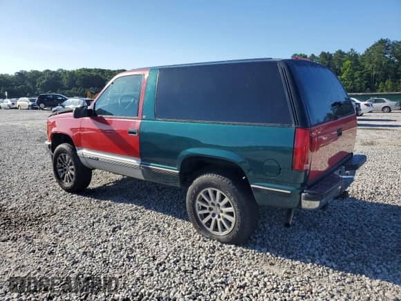1996 Chevrolet Tahoe с VIN 3GNEK18R3TG159899, выставлен на аукционе Copart как лот 61131635 с пробегом 174 293 миль миль и Списание • Salvage title. История ставок и продаж доступна на DreamBid. Изображение 2.