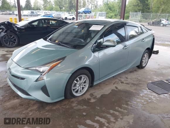 2016 Toyota Prius Four z VIN JTDKARFU9G3024875, wystawiony jako IAAI lot #42314235 z przebiegiem 101 383 mil mil oraz . Historia ofert i sprzedaży dostępna na DreamBid. Obrazek 2.