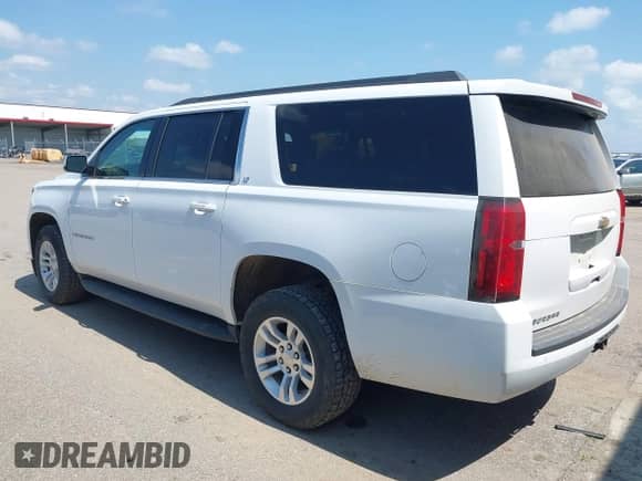 2018 Chevrolet Suburban LT z VIN 1GNSKHKC7JR223312, wystawiony jako IAAI lot #42824285 z przebiegiem 83 667 mil mil oraz . Historia ofert i sprzedaży dostępna na DreamBid. Obrazek 3.