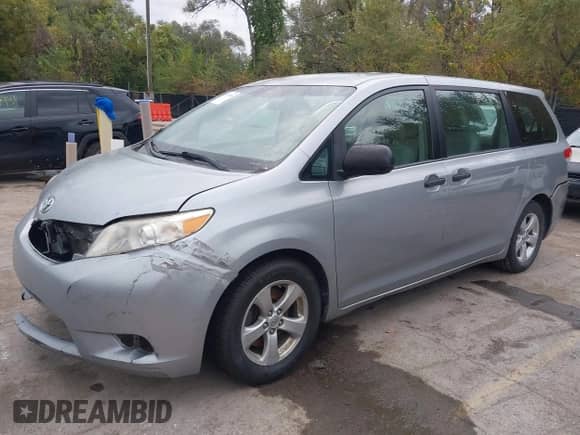 2014 Toyota Sienna L with VIN 5TDZK3DCXES497697, listed as a IAAI auction lot 43397896 with 247,187 mi miles and . Bid and sale history available at DreamBid. Image 2.