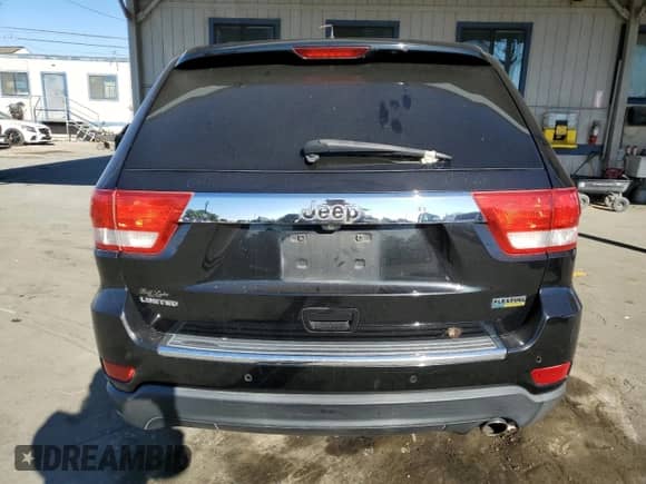 2013 Jeep Grand Cherokee Limited с VIN 1C4RJEBG2DC656944, выставлен на аукционе Copart как лот 82191405 с пробегом Не указан миль и Списание • Salvage title. История ставок и продаж доступна на DreamBid. Изображение 6.