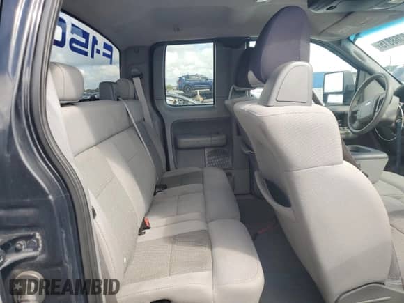 2005 Ford F-150 XLT with VIN 1FTPX12595FB26709, listed as a Copart auction lot 82368815 with 162,849 mi miles and Salvage title. Bid and sale history available at DreamBid. Image 10.