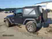 2013 Jeep Wrangler Sport with VIN 1C4AJWAG7DL655003, listed as a Copart auction lot 61839615 with 66,539 mi miles and Salvage title. Bid and sale history available at DreamBid. Image 2.