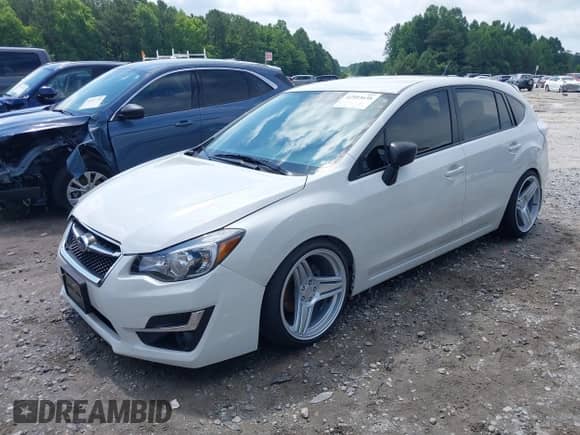 2015 Subaru Impreza 2.0i with VIN JF1GPAA67FH292264, listed as a IAAI auction lot 42503638 with 51,178 mi miles and . Bid and sale history available at DreamBid. Image 2.