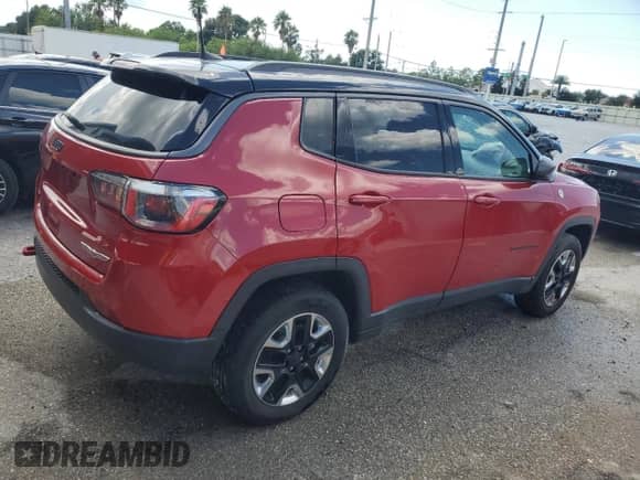 2017 Jeep Compass Trailhawk with VIN 3C4NJDDB9HT674796, listed as a Copart auction lot 80738795 with 58,865 mi miles and Salvage title. Bid and sale history available at DreamBid. Image 3.