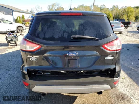 2014 Ford Escape SE with VIN 1FMCU0G90EUA06754, listed as a Copart auction lot 85709575 with 215,291 mi miles and Non repairable. Bid and sale history available at DreamBid. Image 6.