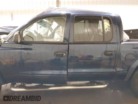 2004 Dodge Dakota Sport with VIN 1D7HG38N44S615599, listed as a IAAI auction lot 41821822 with Not provided miles and . Bid and sale history available at DreamBid. Image 14.