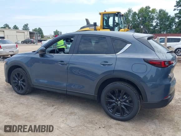 2025 Mazda CX-5 S Carbon Edition z VIN JM3KFBCM5S0702469, wystawiony jako IAAI lot #43076943 z przebiegiem 725 mil mil oraz . Historia ofert i sprzedaży dostępna na DreamBid. Obrazek 15.