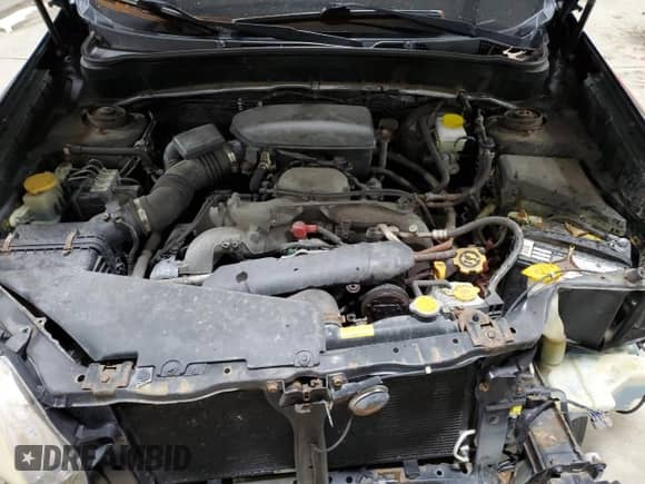 2009 Subaru Forester X z VIN JF2SH63619G790712, wystawiony jako Copart lot #52878055 z przebiegiem 91 290 mil mil oraz Szkoda całkowita • Salvage title. Historia ofert i sprzedaży dostępna na DreamBid. Obrazek 12.