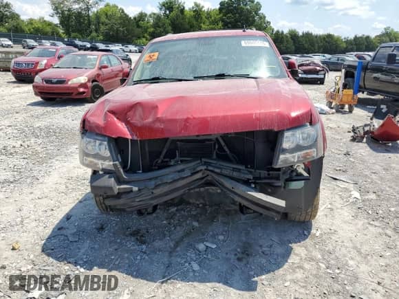 2014 Chevrolet Tahoe LT with VIN 1GNSCBE06ER117340, listed as a Copart auction lot 69040115 with 69,592 mi miles and Salvage title. Bid and sale history available at DreamBid. Image 5.