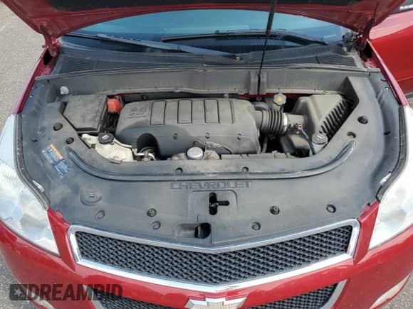 2012 Chevrolet Traverse 2LT z VIN 1GNKVJED7CJ237912, wystawiony jako Copart lot #59508255 z przebiegiem 124 031 mil mil oraz Szkoda całkowita • Salvage title. Historia ofert i sprzedaży dostępna na DreamBid. Obrazek 12.