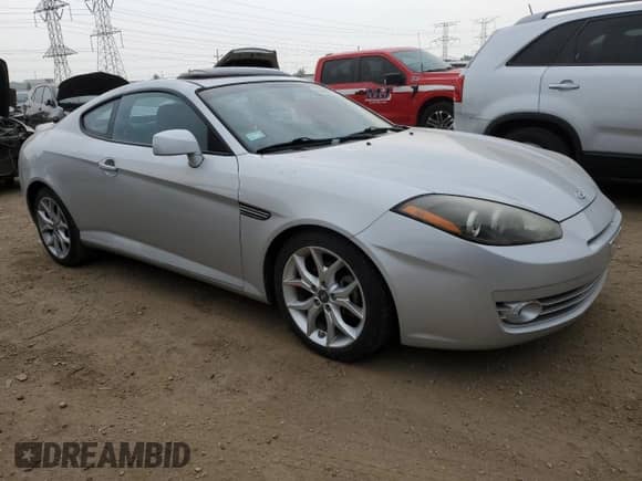 2008 Hyundai Tiburon GT с VIN KMHHN66F48U267449, выставлен на аукционе Copart как лот 60406785 с пробегом 25 262 миль миль и Списание • Salvage title. История ставок и продаж доступна на DreamBid. Изображение 4.