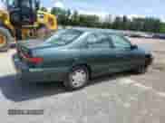 1999 Toyota Camry LE z VIN 4T1BG22K7XU443923, wystawiony jako Copart lot #61206005 z przebiegiem 265 239 mil mil oraz Czysty tytuł • Clean title. Historia ofert i sprzedaży dostępna na DreamBid. Obrazek 3.