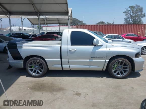 2005 Dodge RAM with VIN 3D3HA16H75G830570, listed as a IAAI auction lot 42586838 with 40,449 mi miles and . Bid and sale history available at DreamBid. Image 14.
