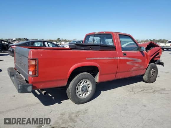 1993 Dodge Dakota S с VIN 1B7FL26X2PS175592, выставлен на аукционе Copart как лот 76744054 с пробегом 94 863 миль миль и Списание • Salvage title. История ставок и продаж доступна на DreamBid. Изображение 3.