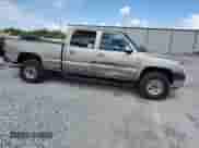 2001 Chevrolet Silverado 2500HD LS with VIN 1GCHC23U21F120613, listed as a Copart auction lot 84431235 with 307,038 mi miles and Salvage title. Bid and sale history available at DreamBid. Image 4.