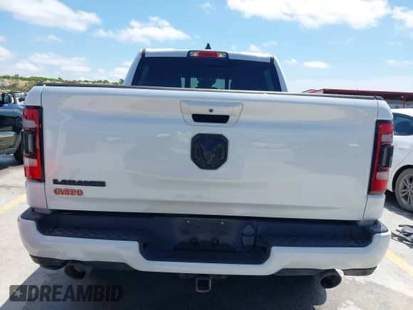 2021 Ram 1500 Laramie with VIN 1C6RREJTXMN704600, listed as a IAAI auction lot 42345097 with 80,180 mi miles and . Bid and sale history available at DreamBid. Image 16.