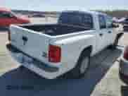 2007 Dodge Dakota SLT с VIN 1D7HE48P77S164721, выставлен на аукционе Copart как лот 49673685 с пробегом 218 861 миль миль и Списание • Salvage title. История ставок и продаж доступна на DreamBid. Изображение 3.