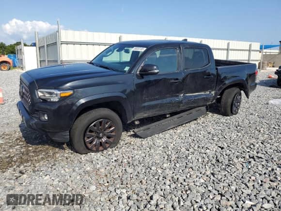 2022 Toyota Tacoma Limited with VIN 3TMGZ5AN8NM506451, listed as a Copart auction lot 56830185 with 58,941 mi miles and Salvage title. Bid and sale history available at DreamBid. Image 1.