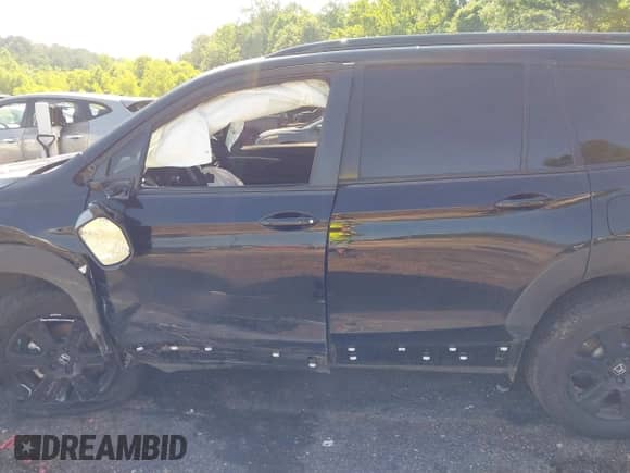 2022 Honda Pilot TrailSport with VIN 5FNYF6H84NB085965, listed as a IAAI auction lot 42556978 with 85,611 mi miles and . Bid and sale history available at DreamBid. Image 14.