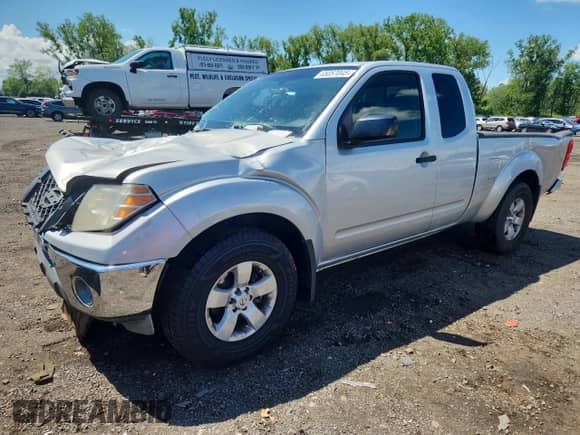 2009 Nissan Frontier SE with VIN 1N6AD06W59C403260, listed as a Copart auction lot 65057045 with 141,838 mi miles and Clean title. Bid and sale history available at DreamBid. Image 1.
