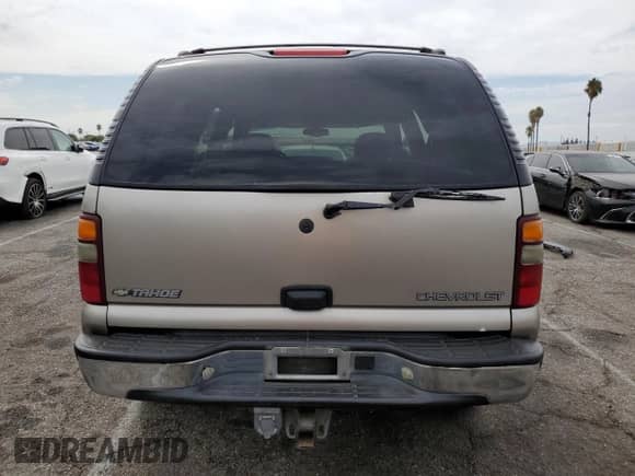 2002 Chevrolet Tahoe LS с VIN 1GNEC13T52R144724, выставлен на аукционе Copart как лот 70594475 с пробегом 188 399 миль миль и Списание • Salvage title. История ставок и продаж доступна на DreamBid. Изображение 6.